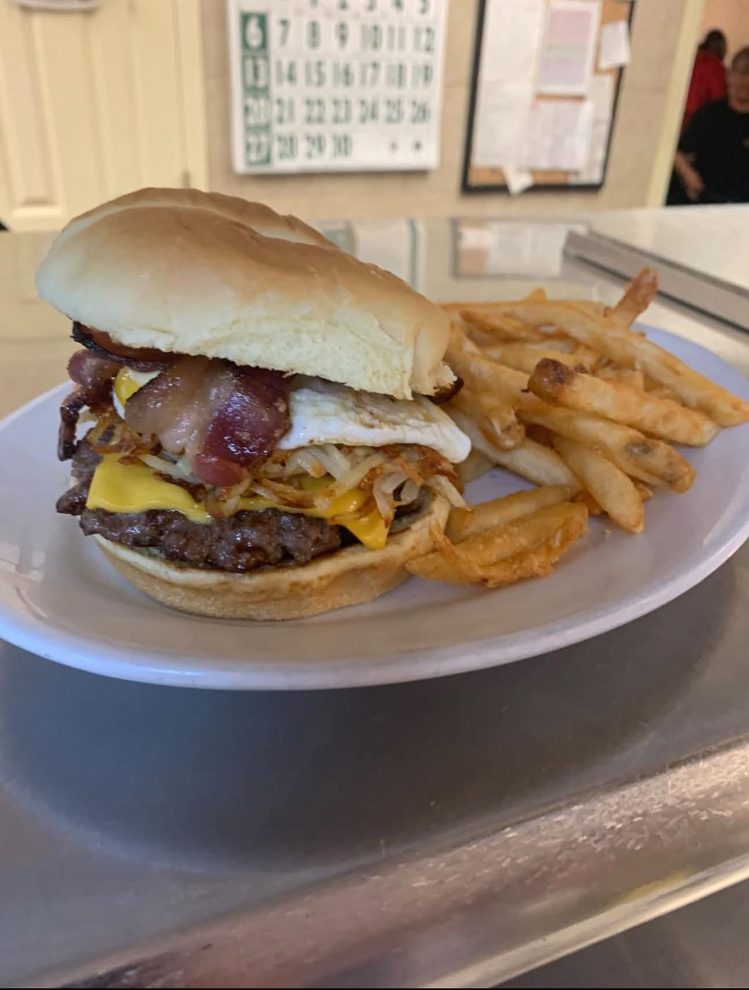 The Brunch Burger, with egg, hash browns, bacon and cheese, served with fries