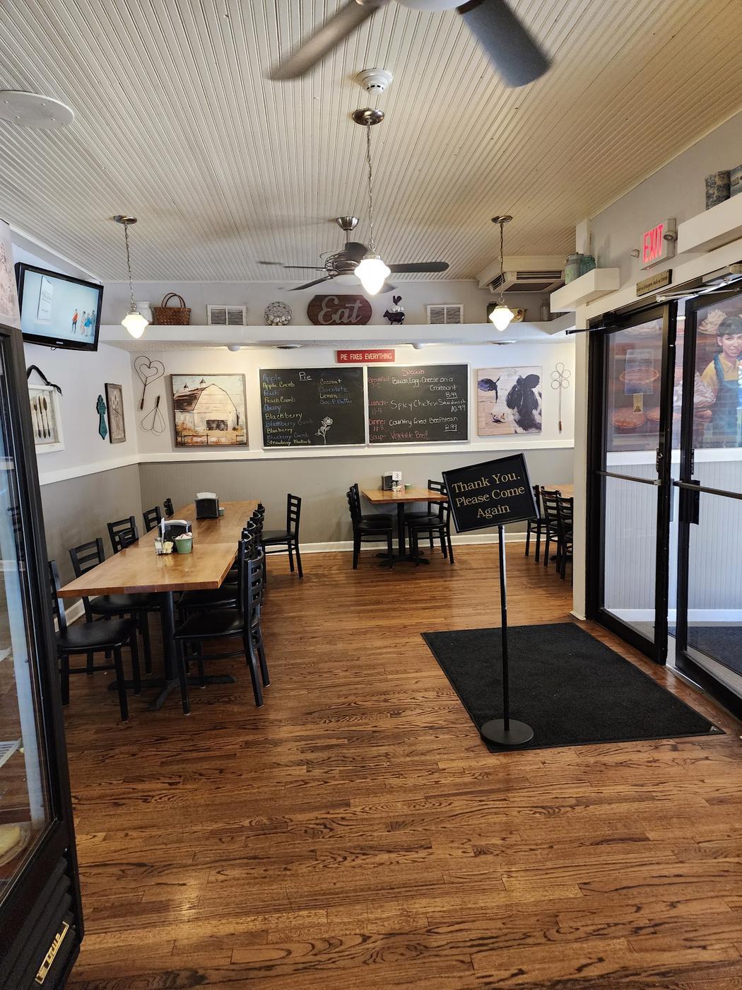 Cowan's dining room seen from the front door, with the pie board and specials board on the far wall